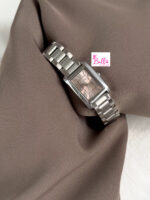 Montre Scottie - rose et bande argentée (+ boîte + sac + ajusteur de bande)