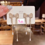 Boucles d’oreilles - noeud en zircon – Image 3