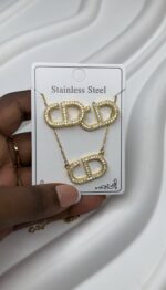 Ensemble de bijoux Christian Dior - collier et boucles d’oreilles doré (acier inoxydable)