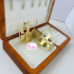 Boucles d’oreilles cerceaux tort Burch - doré (acier inoxydable)