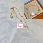 Ensemble de bijoux collier et bracelet Tory Burch - doré (acier inoxydable)