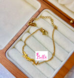 Ensemble de bijoux collier + boucles d’oreilles + bracelet + bague Yves saint Laurent - doré (acier inoxydable) – Image 4
