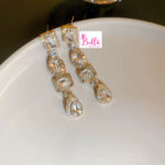 Boucles d’oreilles avec strass et perles - doré